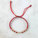 Pulsera Roja Infinito 1gr / 4mm Bolas Lisas Diamantadas 6 und Oro Amarillo ©