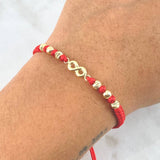 Pulsera Roja Infinito 1gr / 4mm Bolas Lisas Diamantadas 6 und Oro Amarillo ©