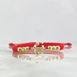 Pulsera Roja Anclada 0.9gr / 4mm Bolas Lisas Diamantadas 6 und Oro Amarillo ©