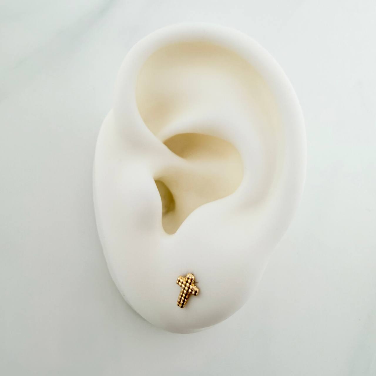 Topos Cruz Relieve 0.5gr / 8mm Oro Amarillo 18K ©