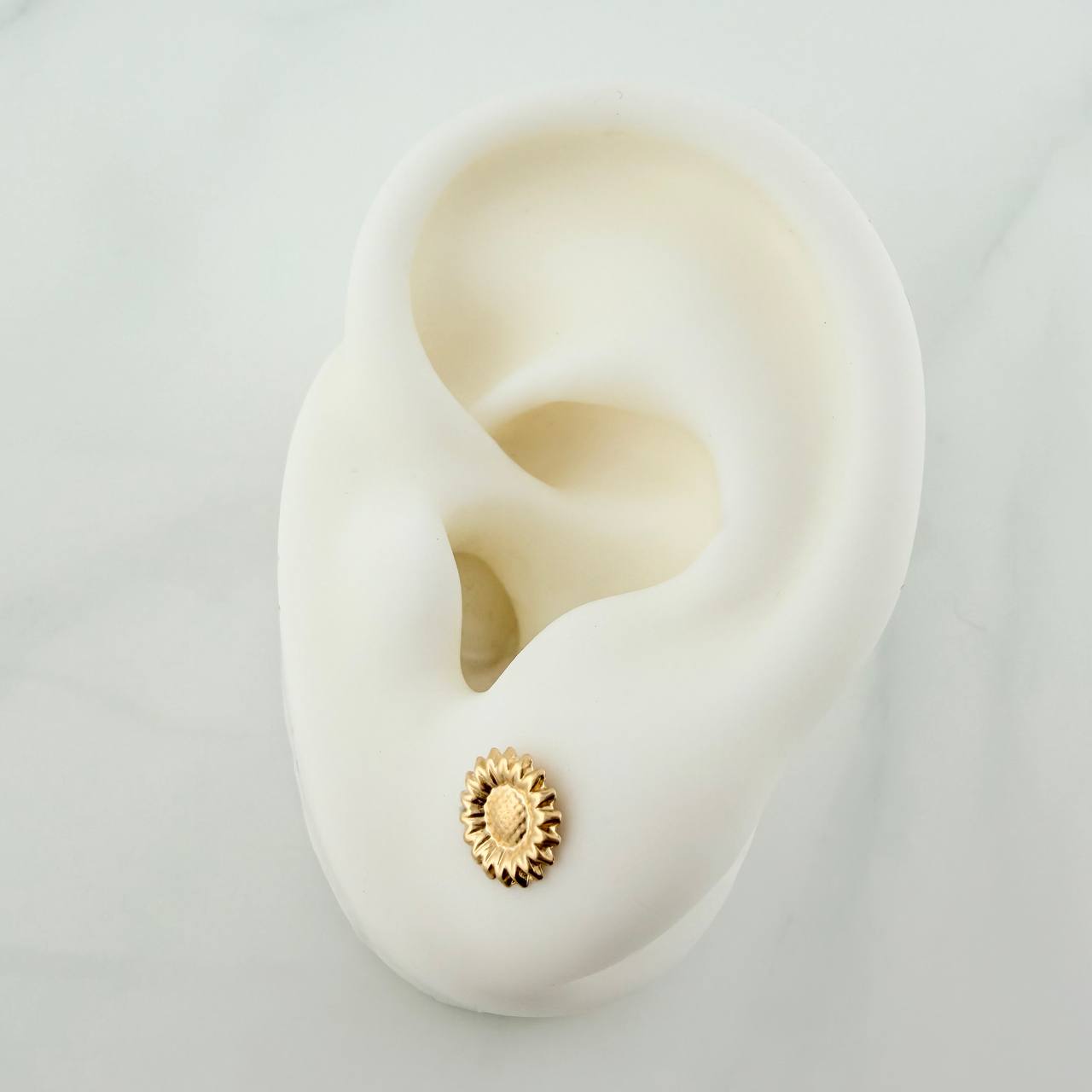Topos Girasol 0.7gr / 7.67mm Oro Amarillo 18K %