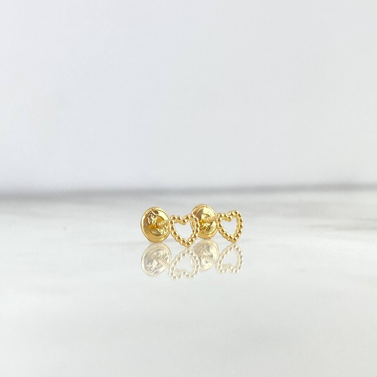 Topos Silueta Corazon Puntos 0.65gr / Oro Amarillo