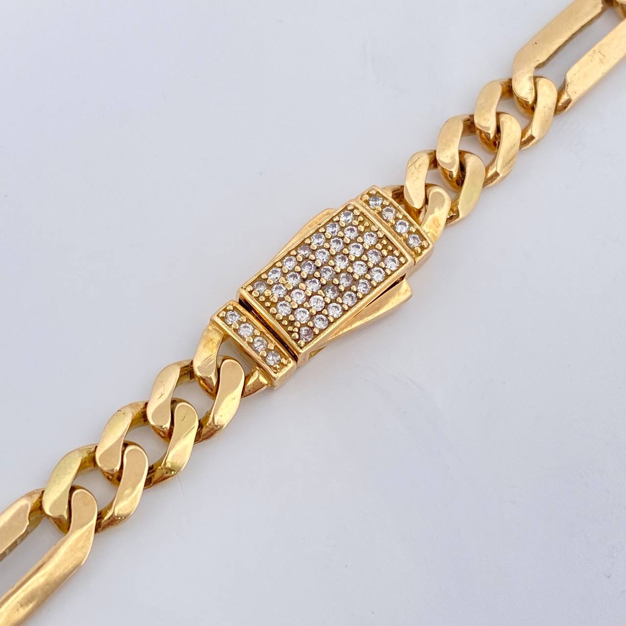 Cadena Figaro 31.25gr / 61.8cm / 7mm Oro Amarillo 18K +