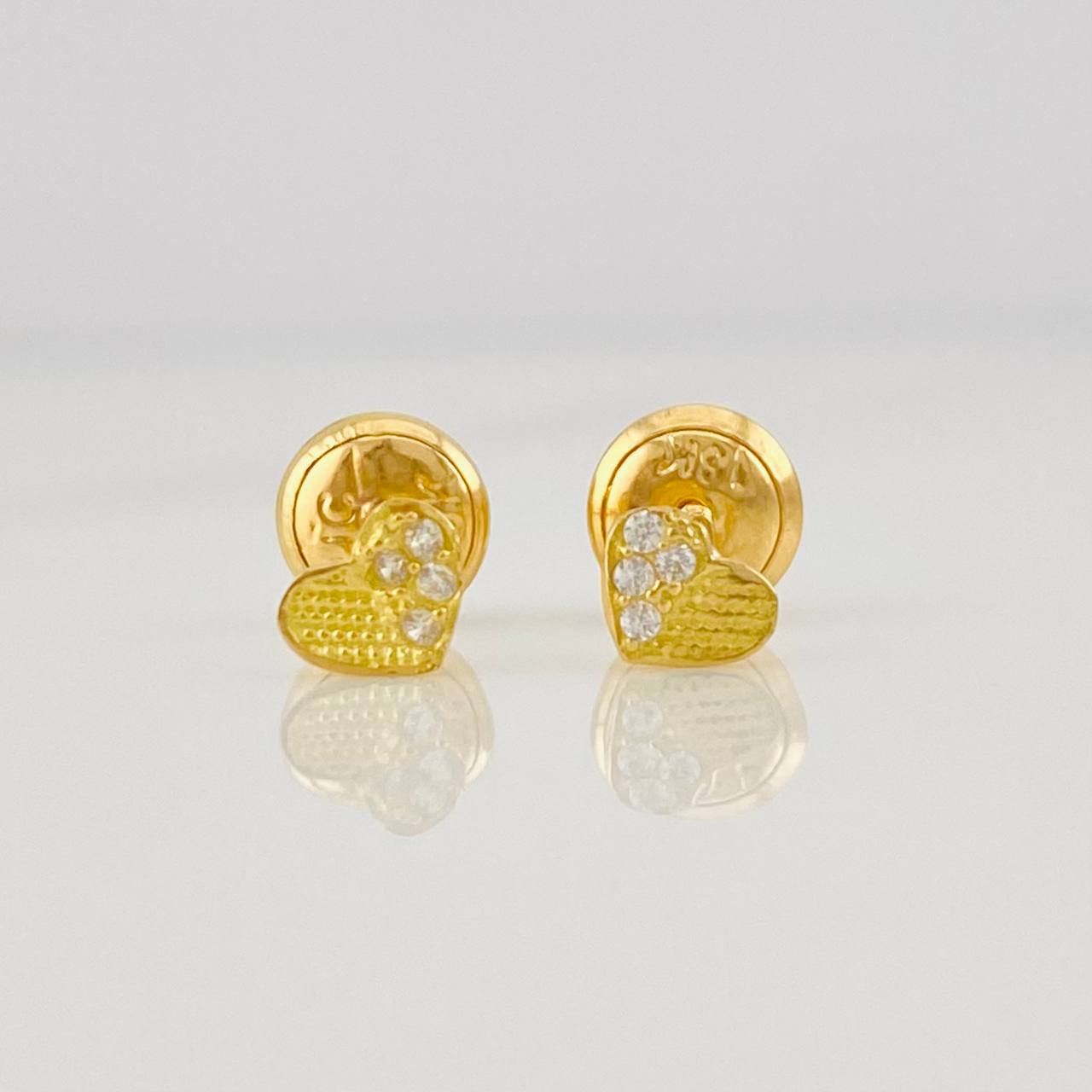 Topos Corazón Medio Destello 0.65g / 4mm Oro Amarillo 18K
