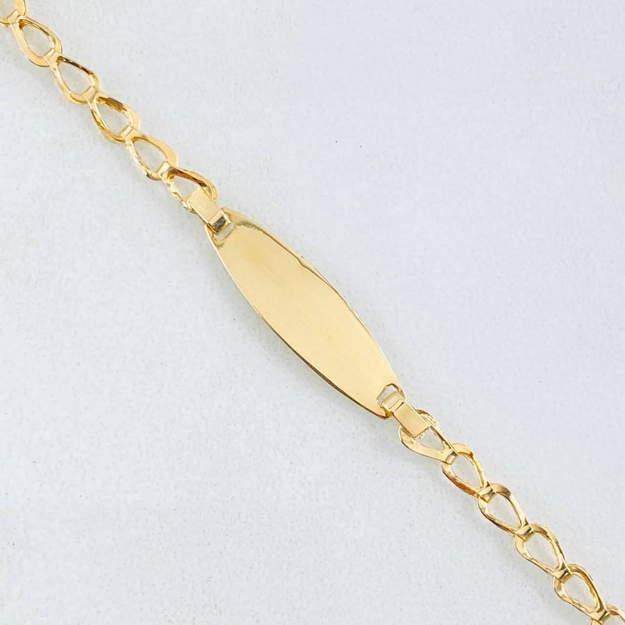 Pulso Bebé Espiga Placa Ovalada 1gr / 12.5cm / Oro Amarillo 18K