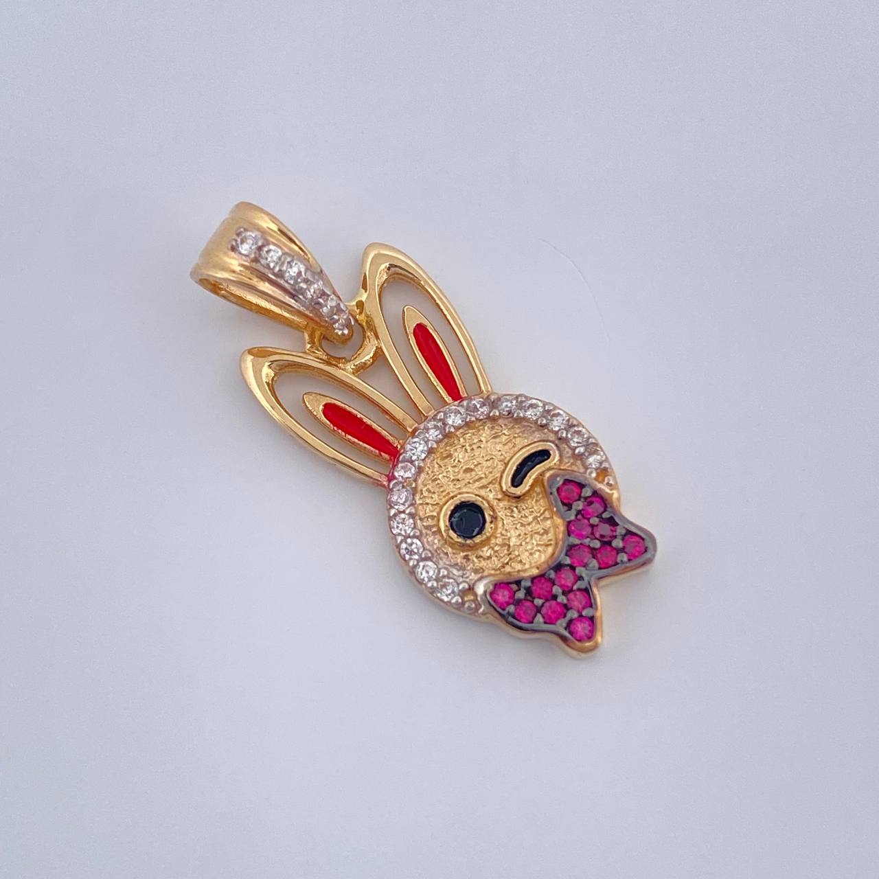 Dije Conejo 2.35gr / 2.5cm / Tres Oros  18K %