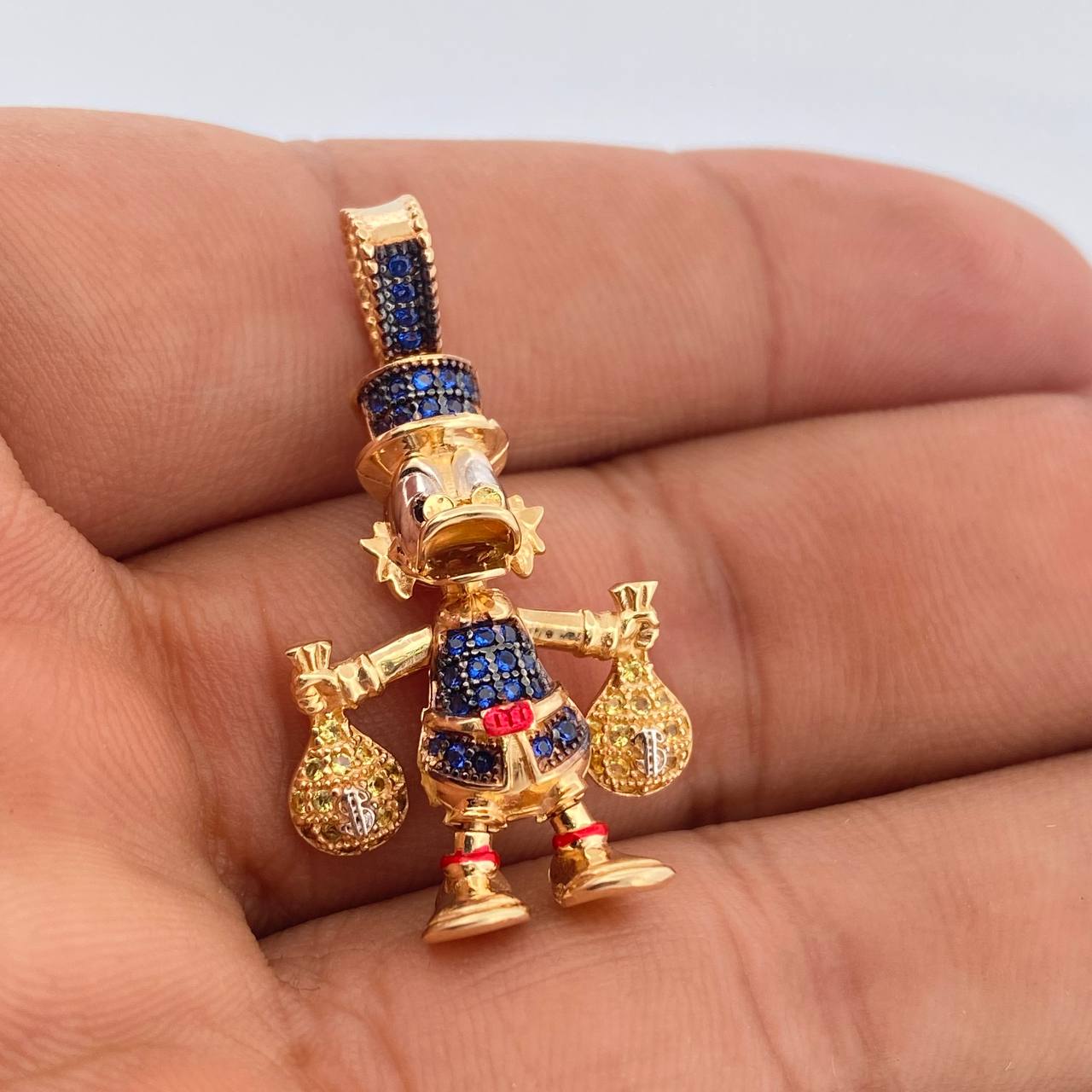 Dije Pato Bolsas Dinero 6gr / 3.5cm / Tres Oros 18K %