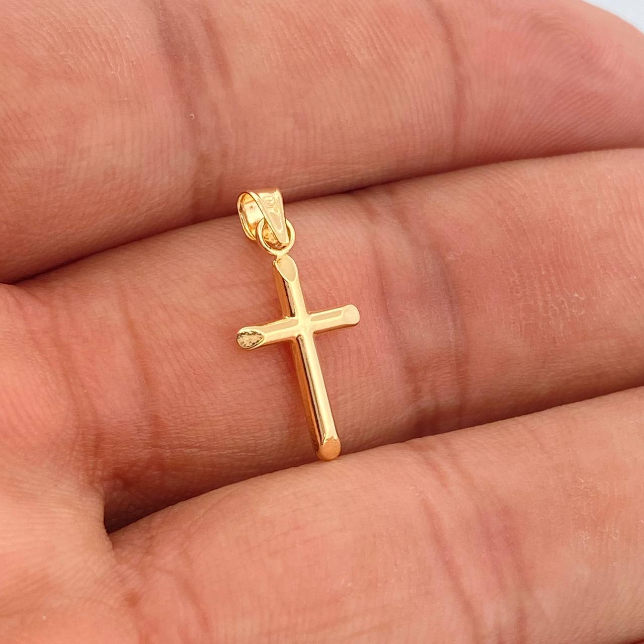 Dije Cruz 0.4gr / 2.2cm / Oro Amarillo 18K %