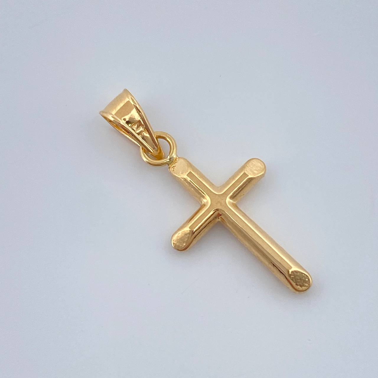 Dije Cruz 0.4gr / 2.2cm / Oro Amarillo 18K %