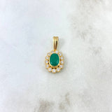 Dije Ovalo Floreado 2.65gr / 2.2cm Esmeralda 75pts Circones Blancos Oro Amarillo (Joya) *