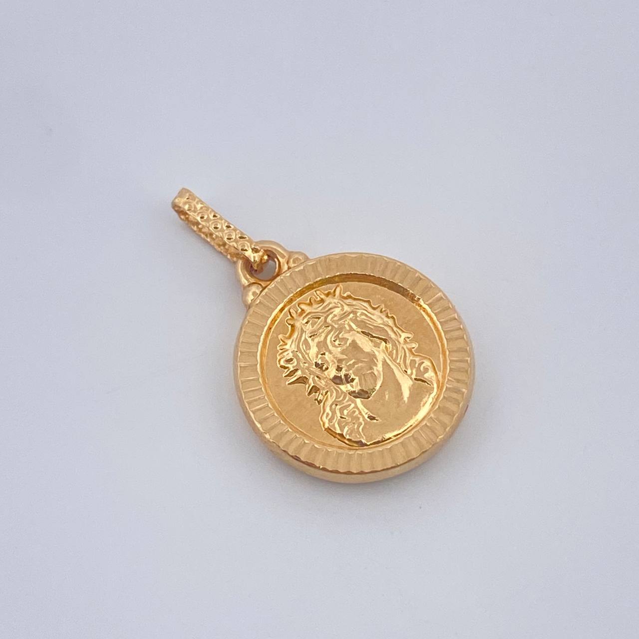 Dije Rostro Cristo 0.95gr / 1.9cm / Oro Amarillo 18K %