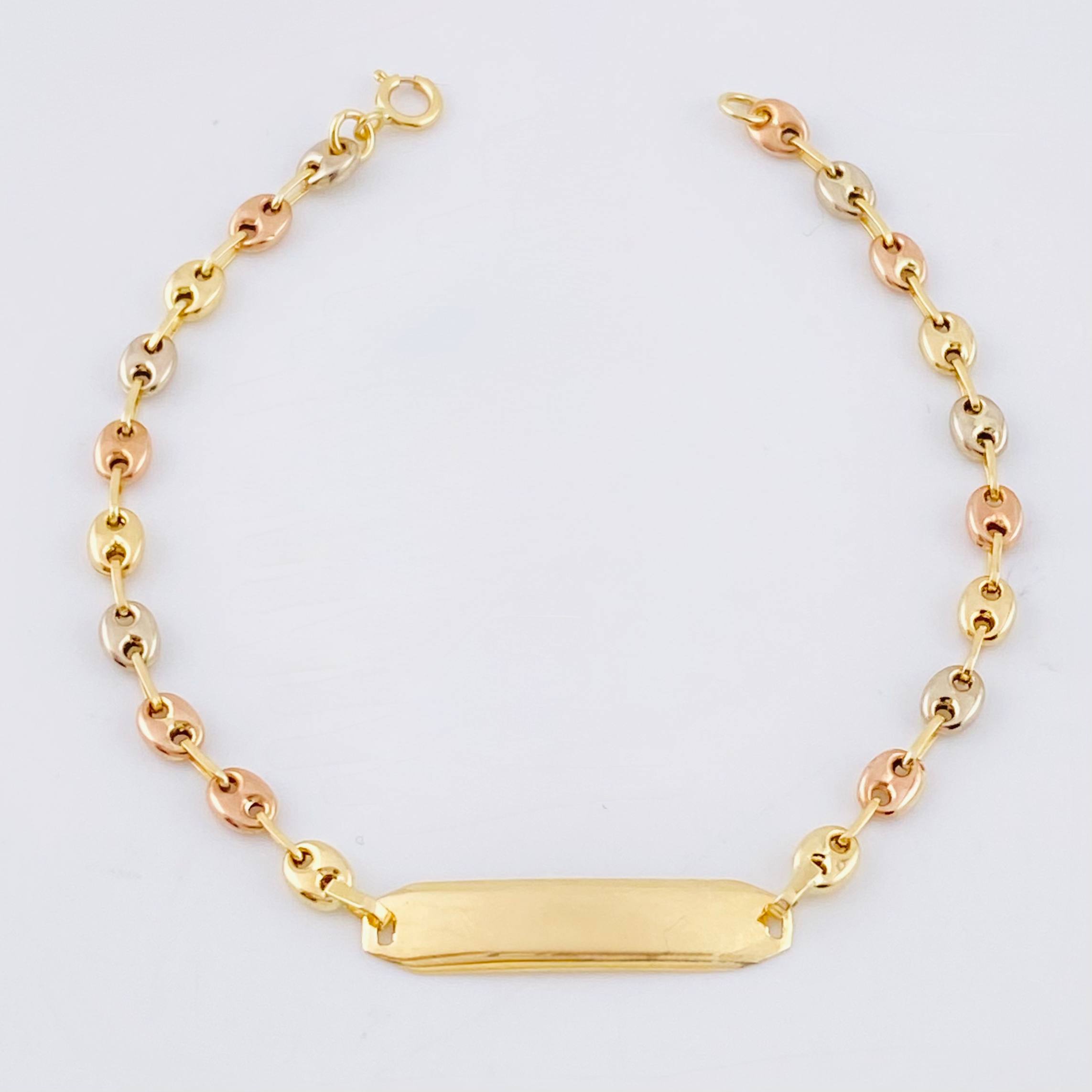 Pulso Bebé GC Placa Hexagonal Curva 1.6gr / 14.5cm / 3mm Tres Oros 18K ©