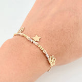 Pulso Aro Seguido Dije Flores y Estrella 3.7g / 18.6cm / 3mm Tres Oros 18K