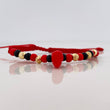 Pulsera Tejida Rojo Protección 5 Bolas Diamantadas Oro Amarillo 18K