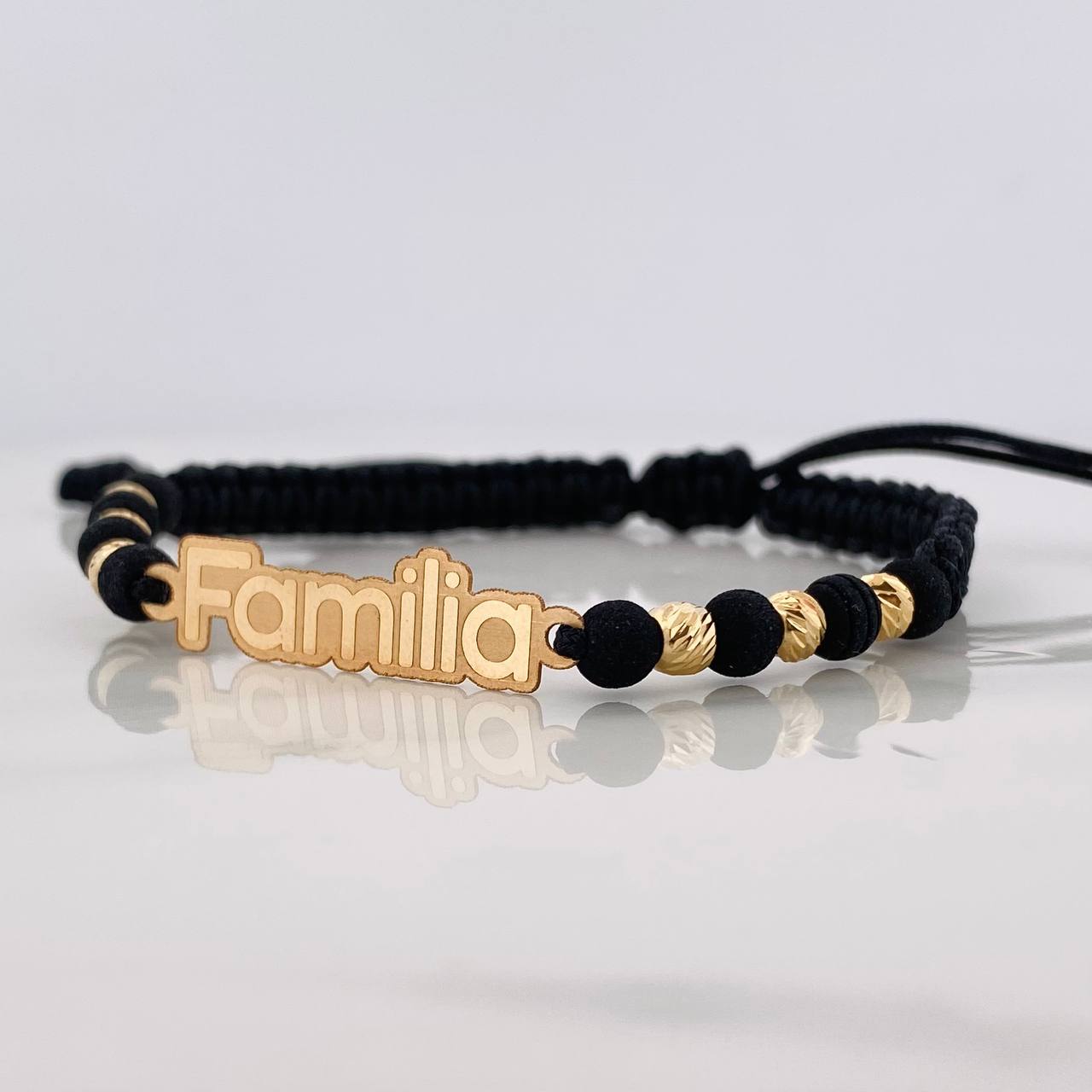 Pulsera Tejida Negra Herraje Placa Familia Oro Amarillo 18K