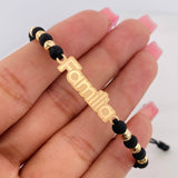 Pulsera Tejida Negra Herraje Placa Familia Oro Amarillo 18K