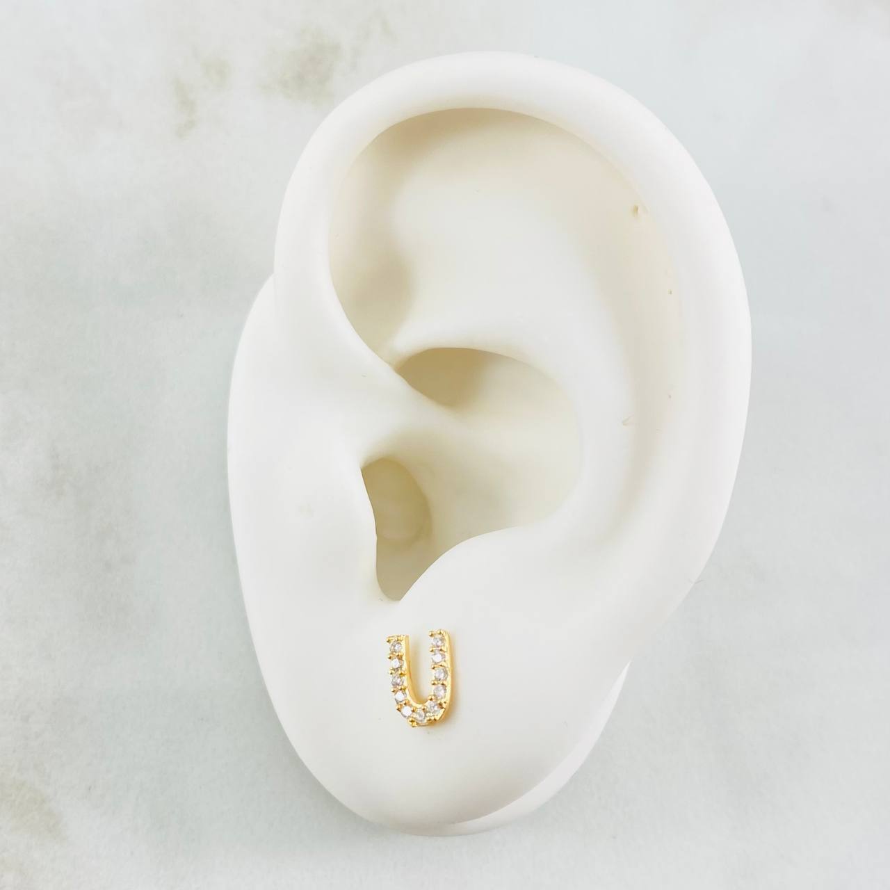 Topos Letra U 0.8gr / Oro Amarillo 18K ©