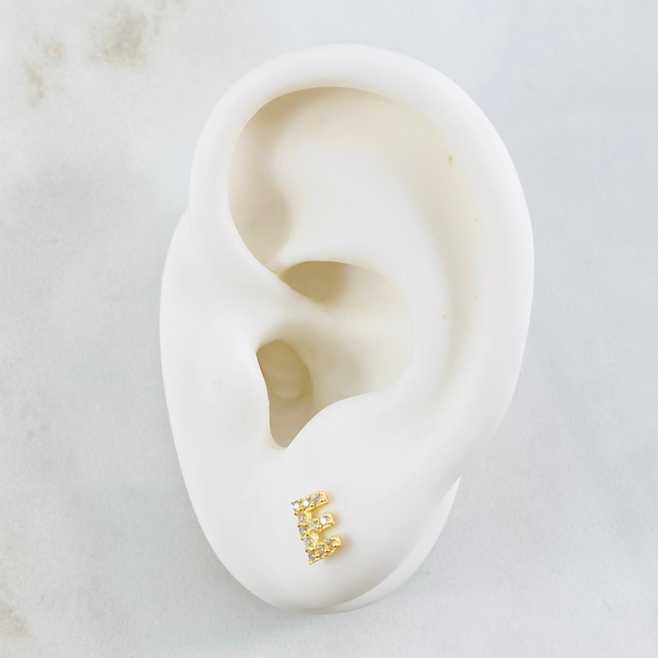 Topos Letra E 0.85gr / 4mm Oro Amarillo 18K