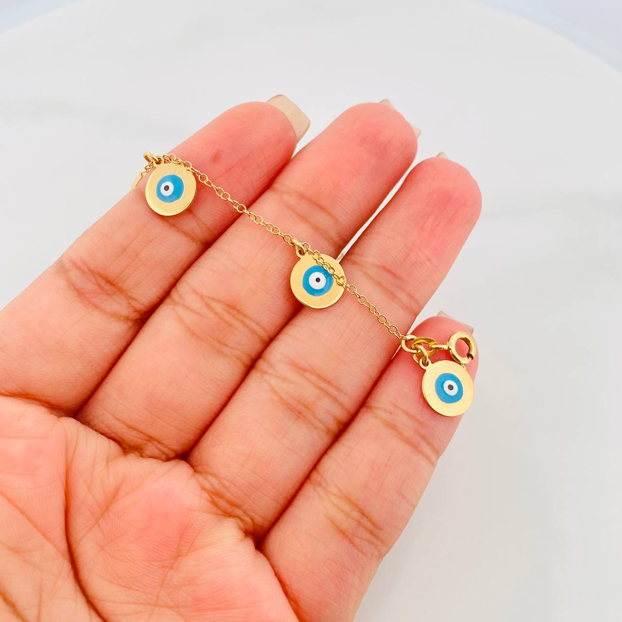 Pulso Bebé Aro Seguido Ojos Turcos 2.5g / 11cm / 1.5mm Oro Amarillo 18K