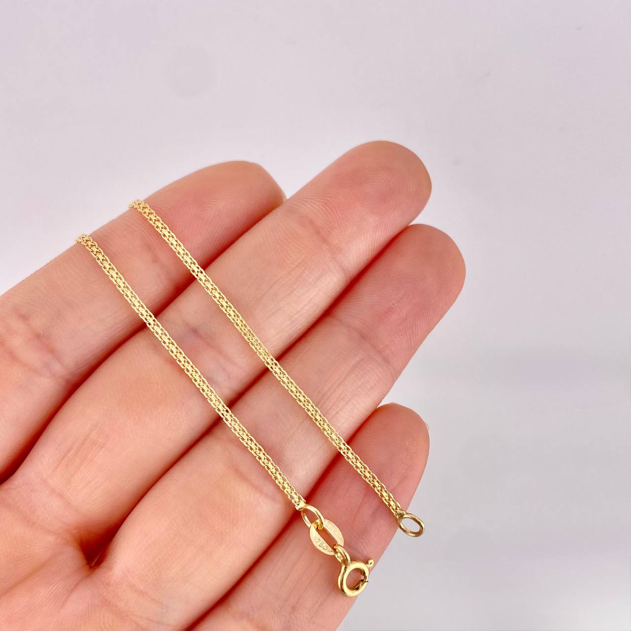 Cadena China 3.2g / 60cm / 1.4mm Oro Amarillo 18K