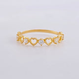 Anillo Corazones Intercalados 1.4g / T7 1/2 Oro Amarillo 18K