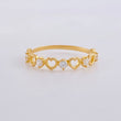 Anillo Corazones Intercalados 1.3g / T6 Oro Amarillo 18K