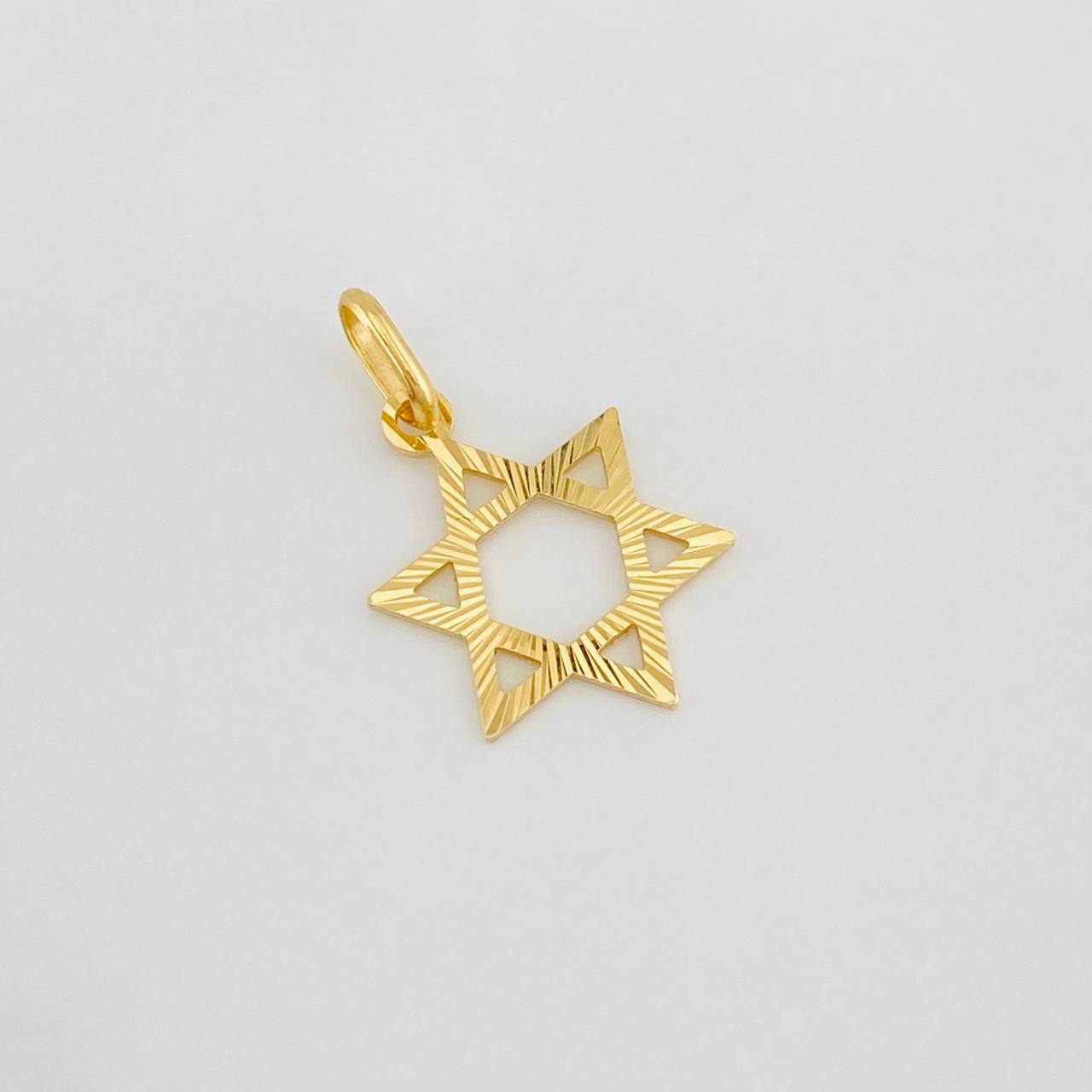 Dije Silueta Estrella Belén 0.75g / 2.2cm Oro Amarillo 18K