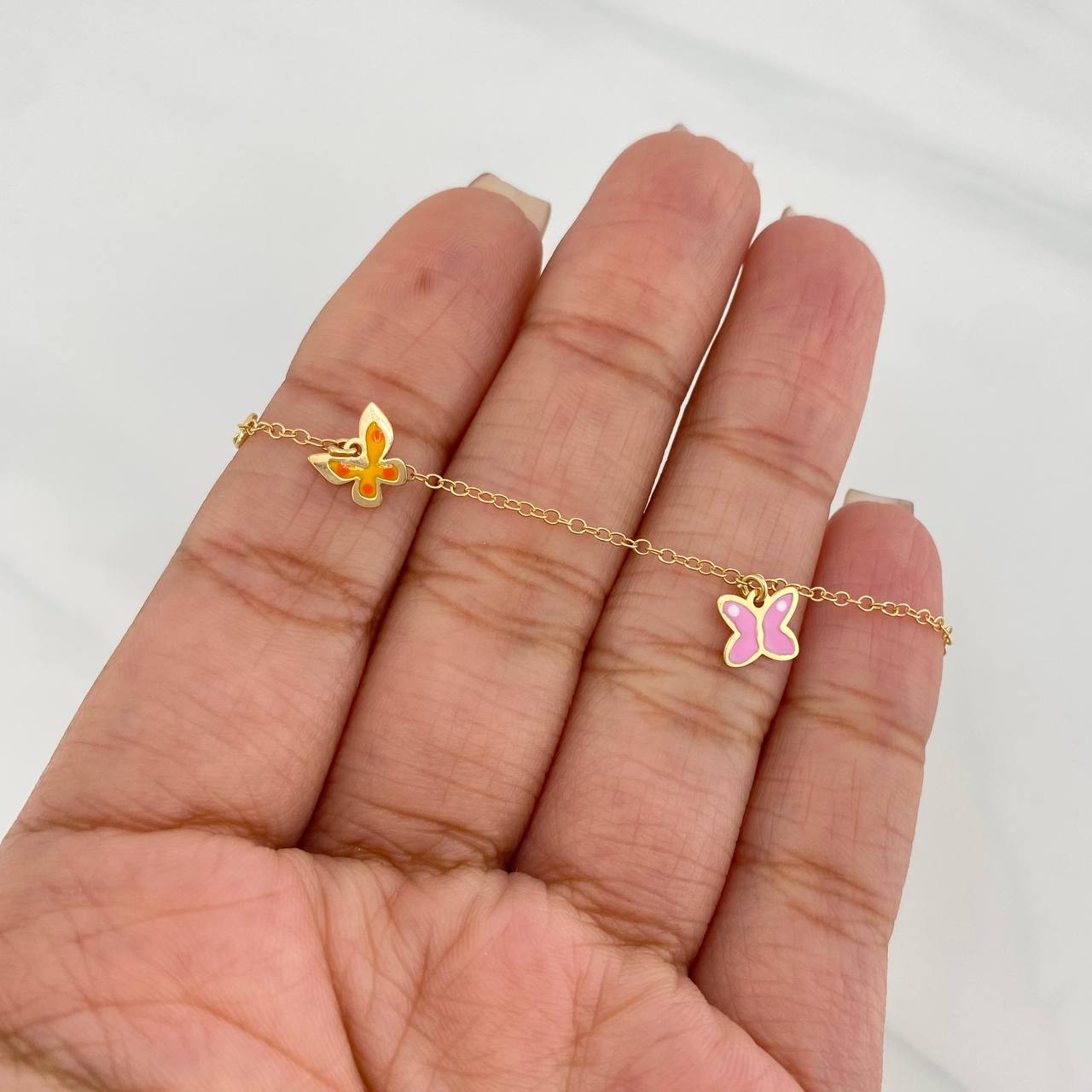 Pulso Bebé Rolo Mariposas 1.45g / 15.05cm / 1.32mm Oro Amarillo 18K