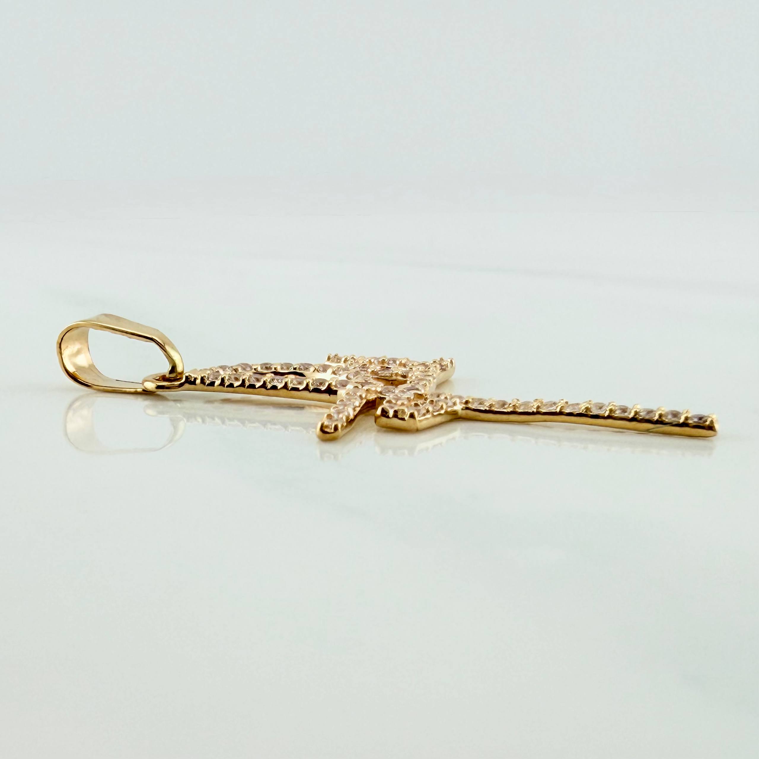 Dije Fe 1.35 g / 2.05 cm Oro Amarillo 18K