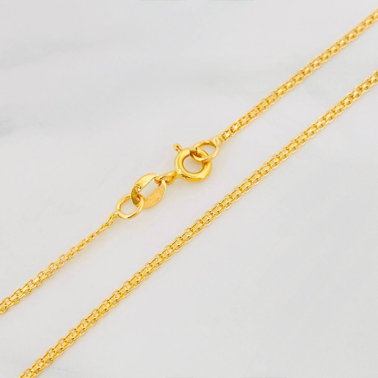 Cadena China 3.2g / 60cm / 1.5mm Oro Amarillo 18K