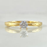 Anillo Solitario Bordeado 1.55gr / T4 3/4 / Oro 18K ©