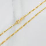 Cadena Figaro 1.8gr / 60cm / 1.55mm Oro Amarillo +1 18K $