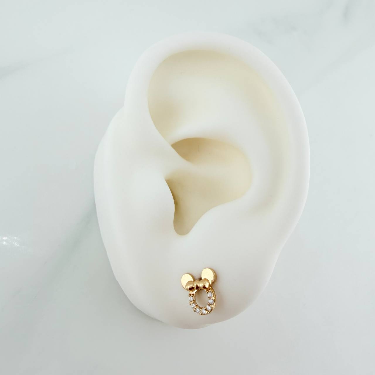 Topos Silueta Ratona 1.25gr / 7.55mm Oro Amarillo 18K %