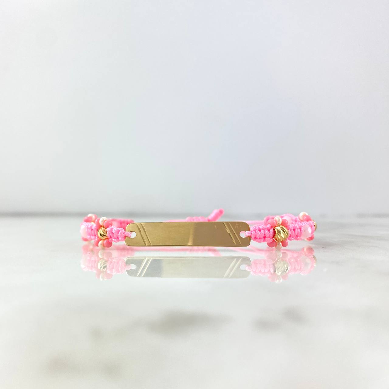 Pulsera Rosada Placa Rayada Floreada 1.6gr / 3cm-0.6cm / 4mm Bolas Diamantadas 4 und Oro Amarillo *