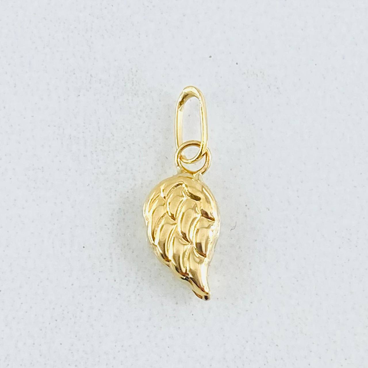 Dije Ala 0.25gr / 1.5cm / Oro Amarillo 18K ©