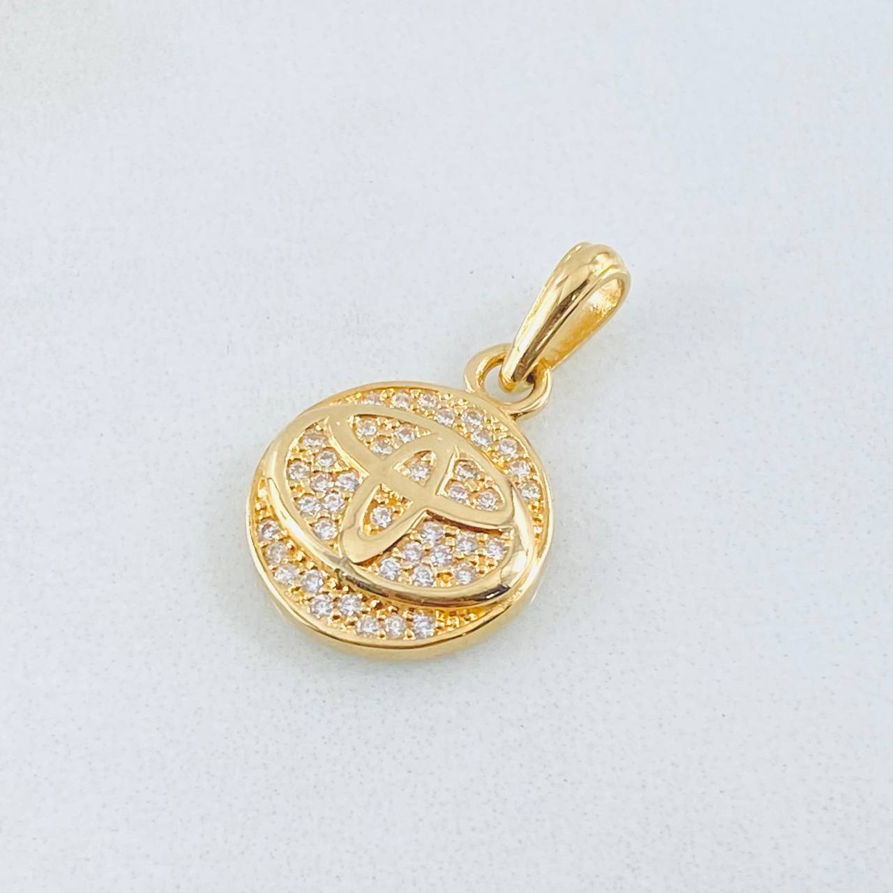 Dije Circulo Marca Automovil 2.35gr / 2.2cm / Oro Amarillo 18K