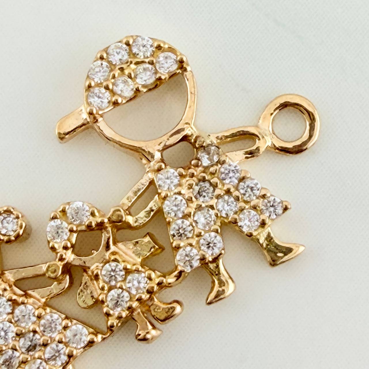 Herraje Familia Silueta 1.6gr / 2.2cm / Oro Amarillo 18K %