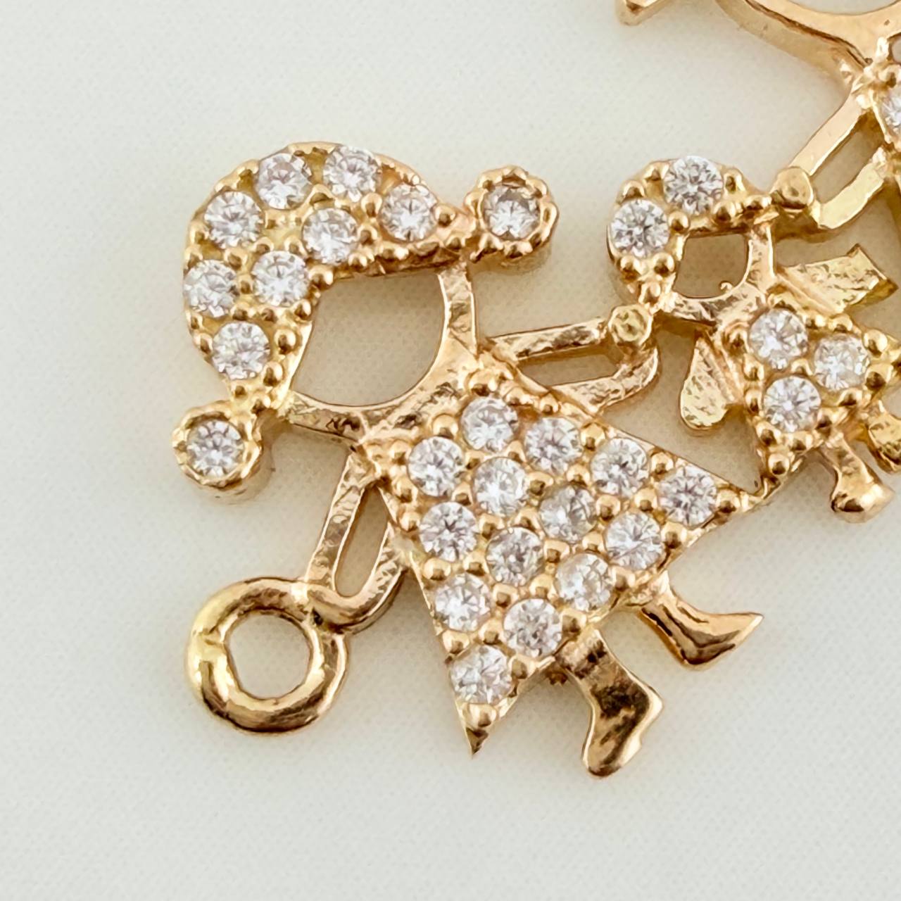 Herraje Familia Silueta 1.6gr / 2.2cm / Oro Amarillo 18K %