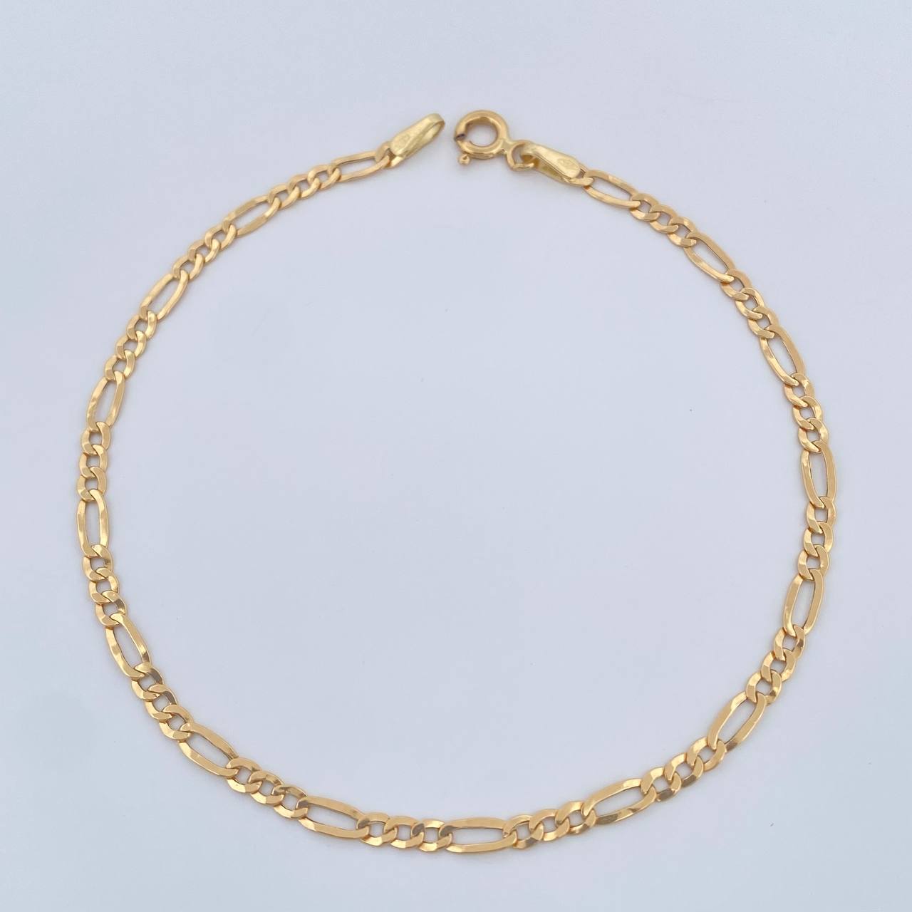 Pulso Figaro 1.1gr / 19cm / 2mm Oro Amarillo +1 18K %