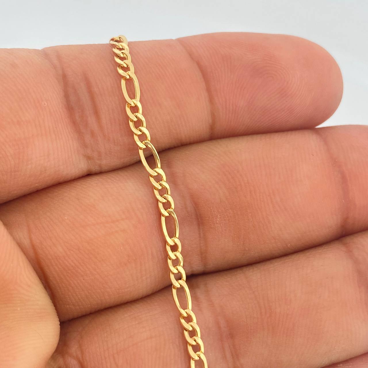 Pulso Figaro 0.65gr / 18.5cm / 2mm Oro Amarillo +1 18K %