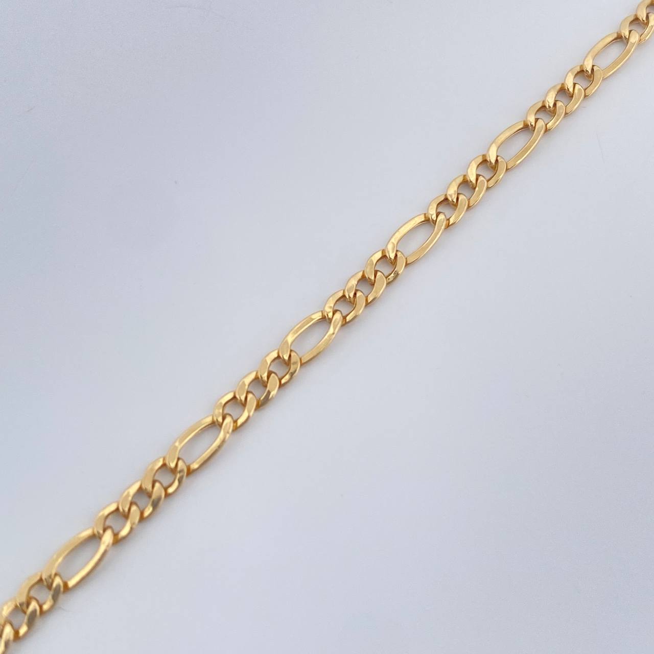 Pulso Figaro 0.65gr / 18.5cm / 2mm Oro Amarillo +1 18K %