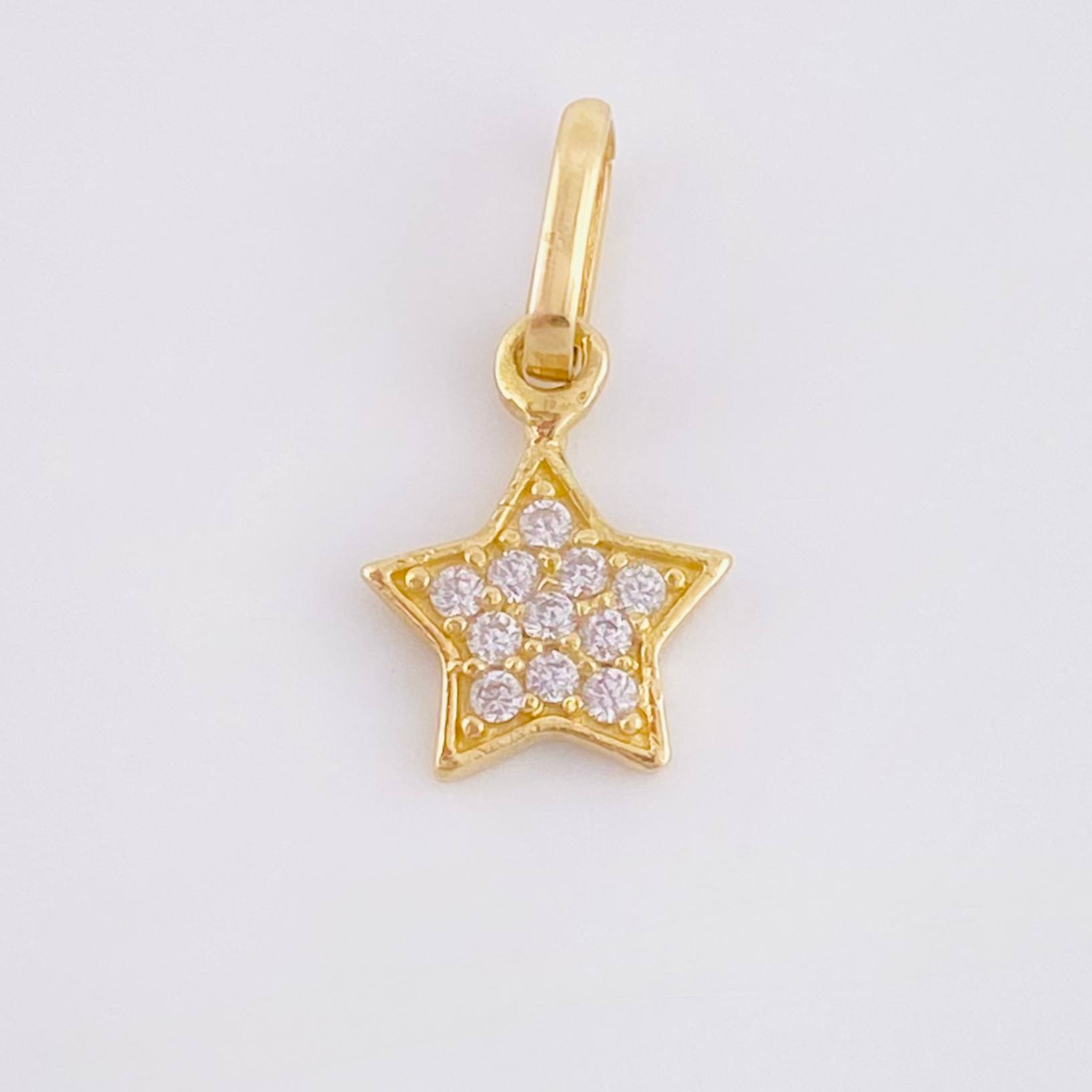 Dije Estrella Tupida 0.6gr / 1.5cm / Oro Amarillo 18K *