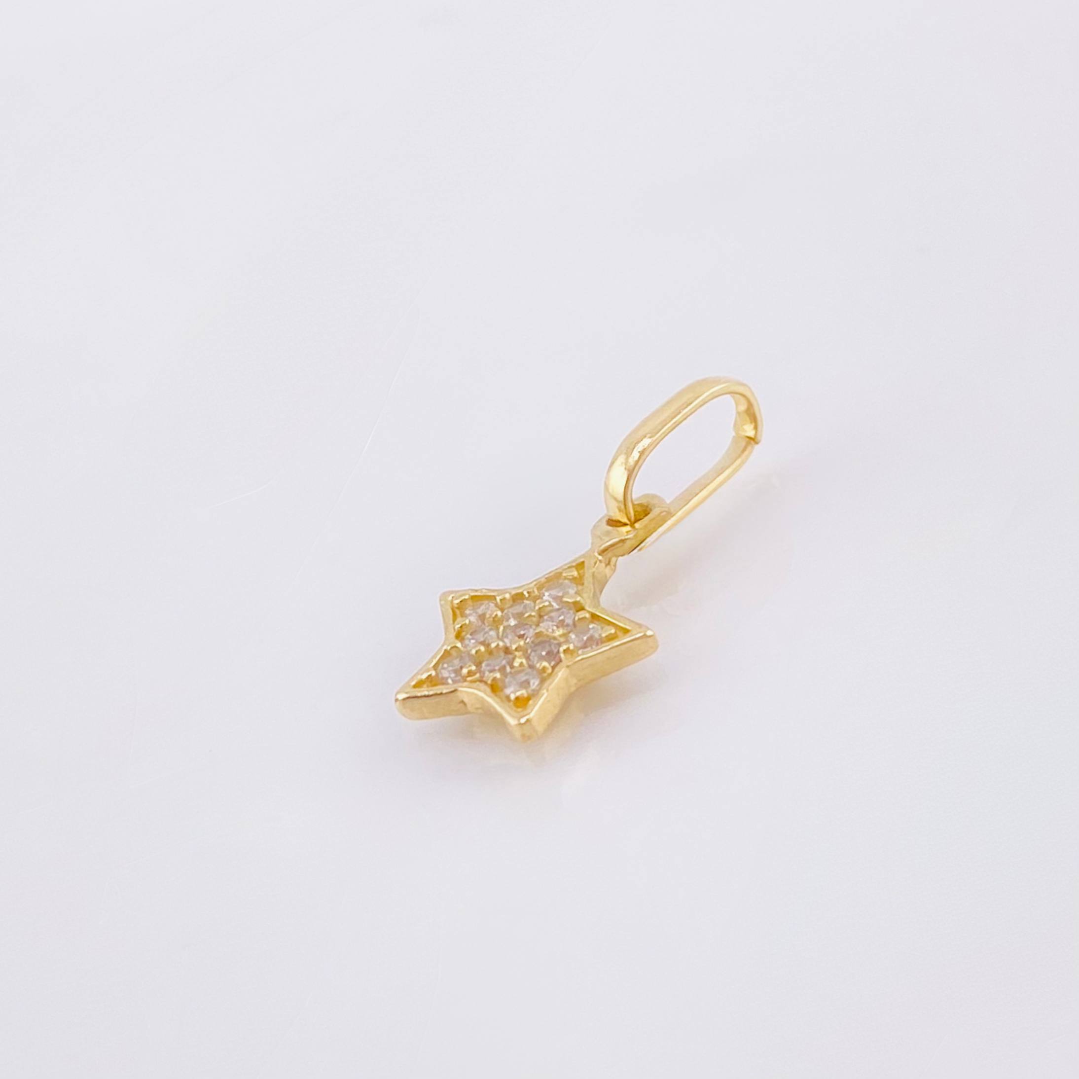Dije Estrella Tupida 0.6gr / 1.5cm / Oro Amarillo 18K *