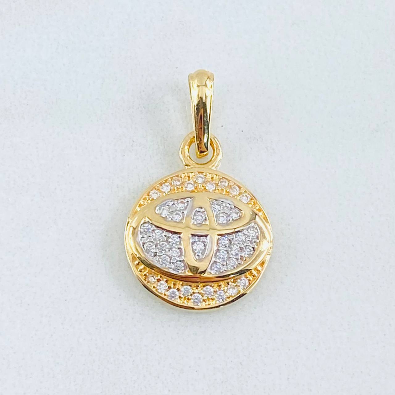 Dije Circulo Marca Automovil 2.25gr / 2.2cm / Oro Amarillo 18K