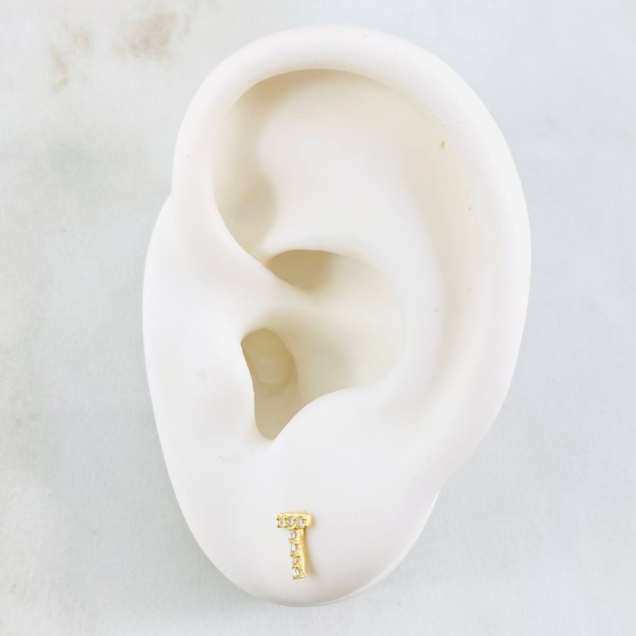 Topos Letra T 0.65gr / Oro Amarillo 18K