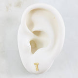 Topos Letra T 0.7gr / 4.3mm Oro Amarillo 18K ©