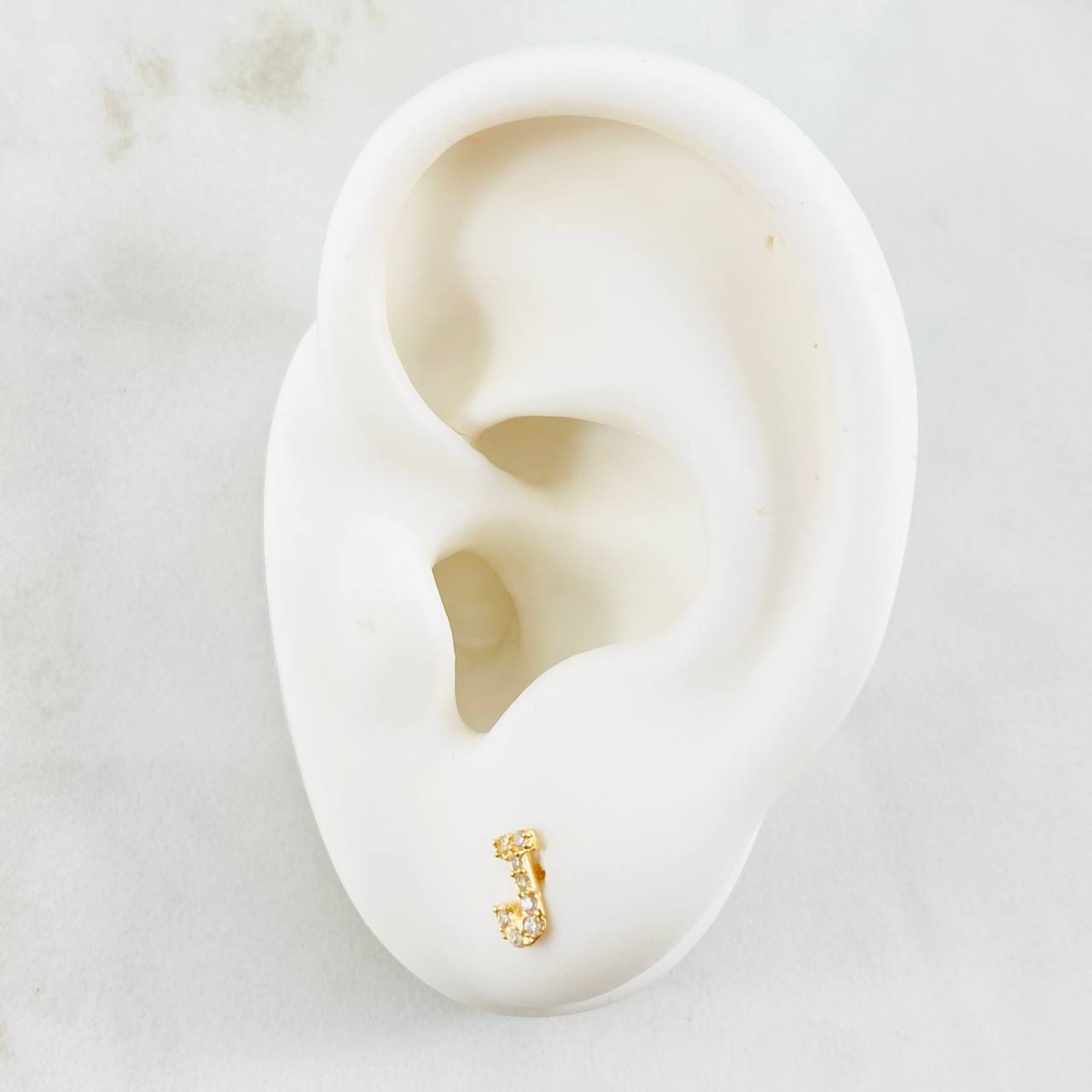 Topos Letra J 0.65gr / 3.7mm Oro Amarillo 18K *