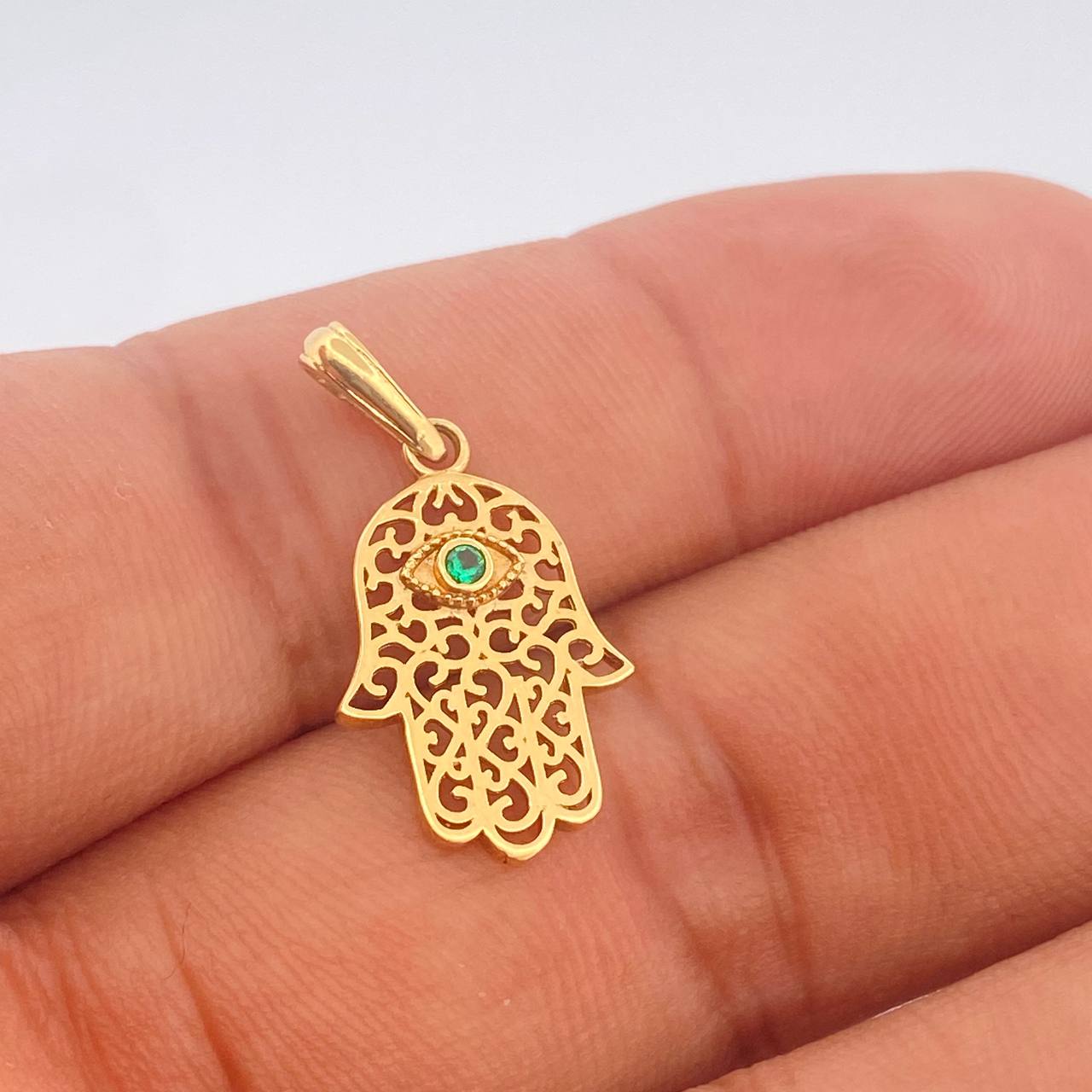 Dije Mano Hamsa 1.3gr / 2.6cm / Oro Amarillo 18K $