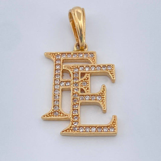 Dije Fe 2.3gr / 2.9cm / Oro Amarillo 18K $