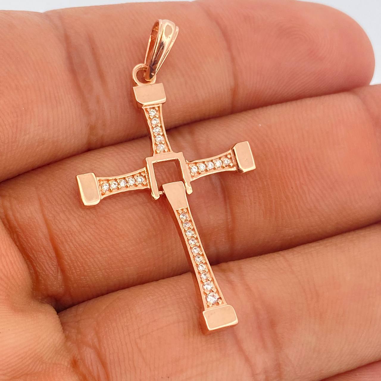 Dije Cruz Movil 2.9gr / 4.4cm / Oro Rosa 18K $